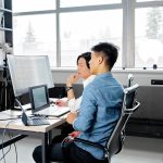 Best SaaS Tools for Startups in 2026: Must Have Software to Scale Faster Business team collaborating on software dashboard
