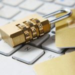 Padlock on keyboard representing online privacy and security