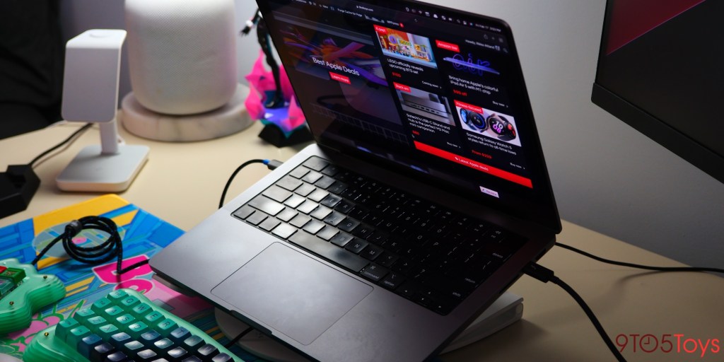 a laptop computer sitting on top of a table