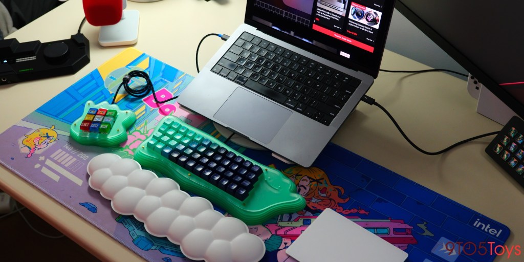 a laptop computer sitting on top of a table