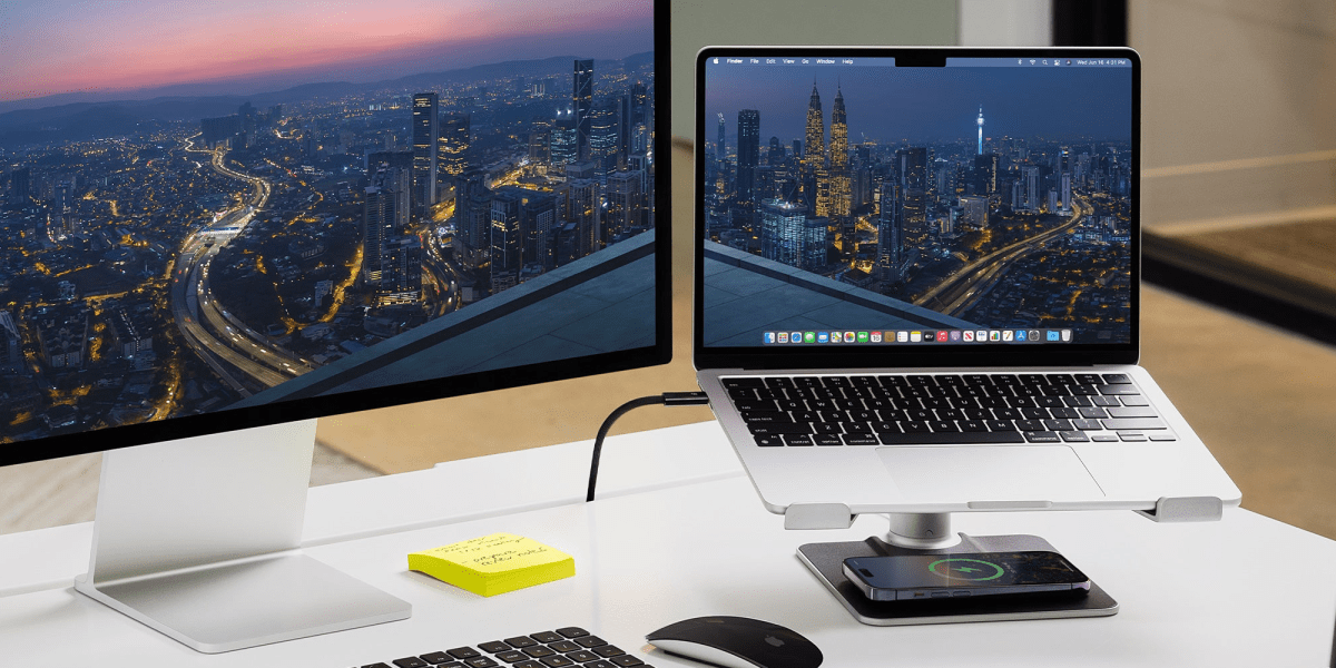 a laptop computer sitting on top of a table