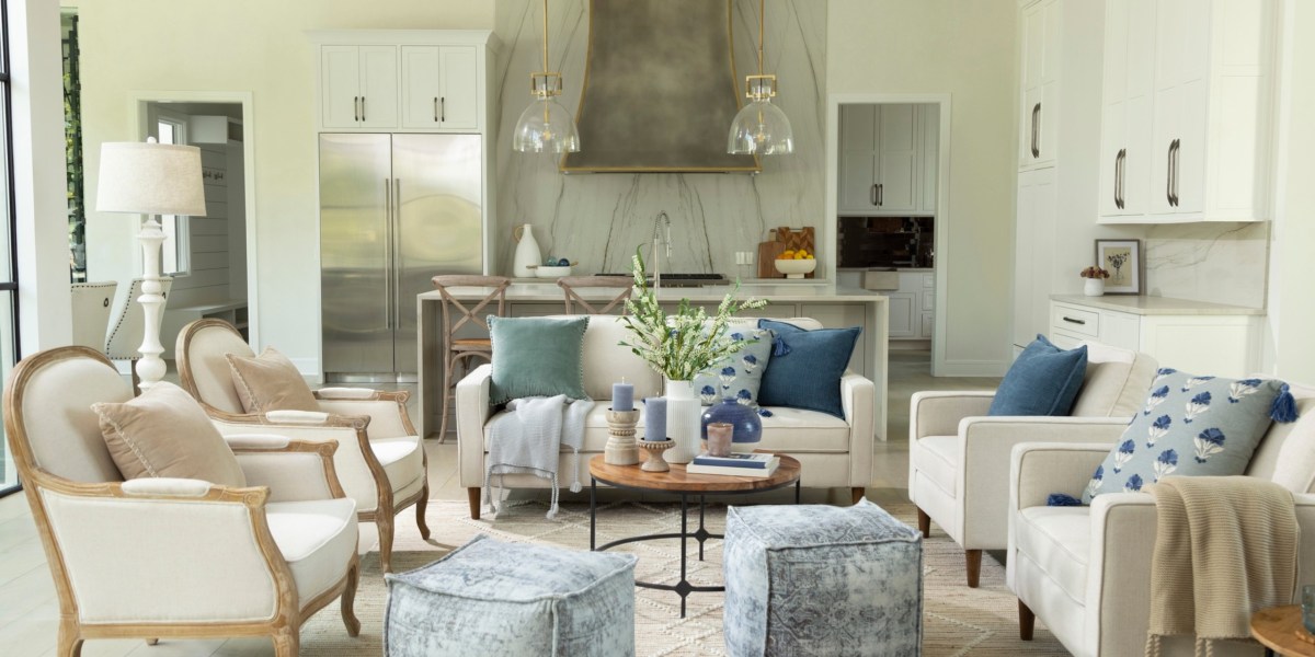 a living room filled with furniture and a fireplace