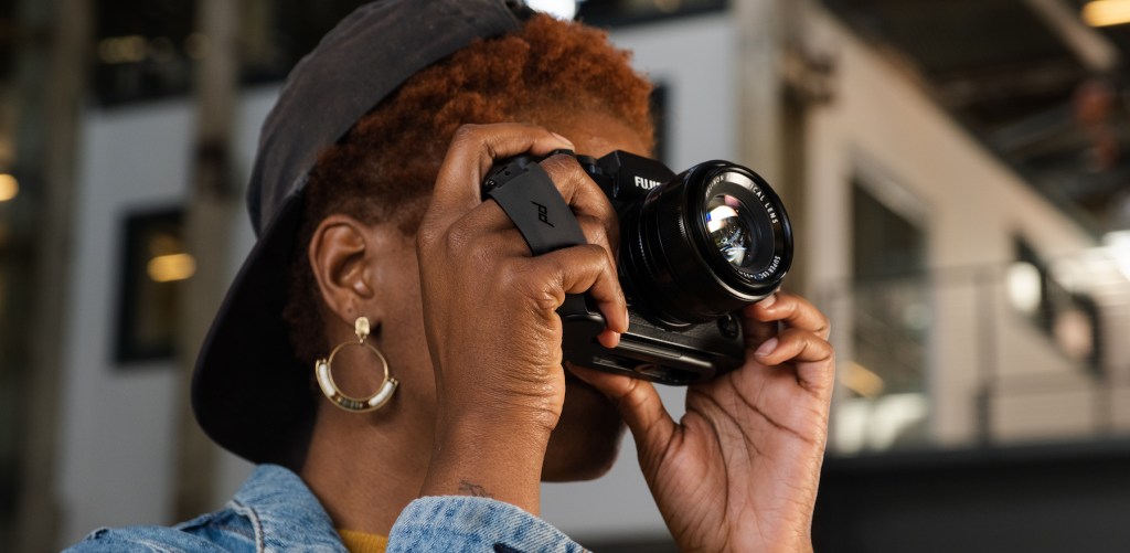 a man holding a camera