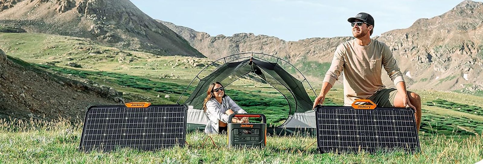 a man standing in front of a fence