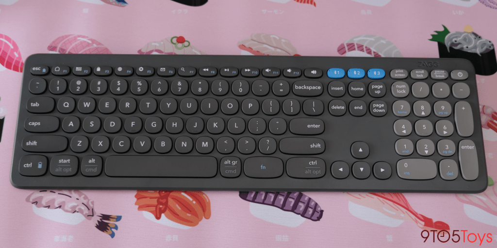 a close up of a computer keyboard sitting on top of a table