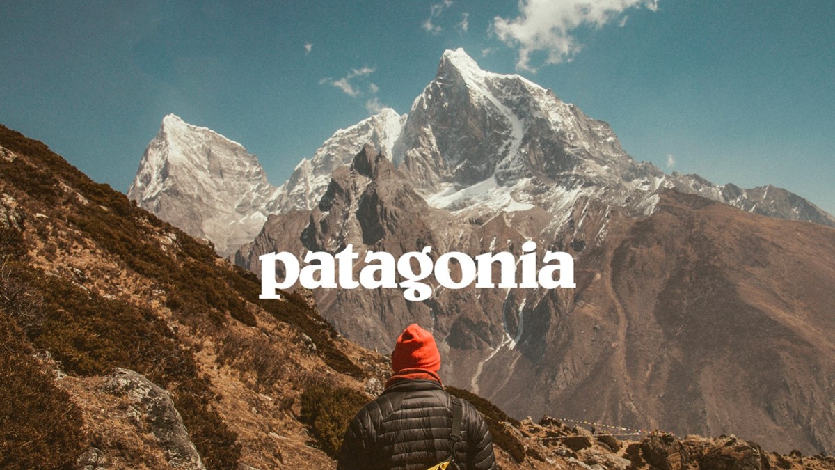 a man standing on a rocky hill