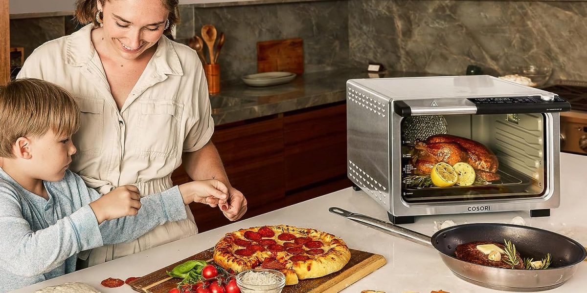 a person standing in front of a plate of pizza