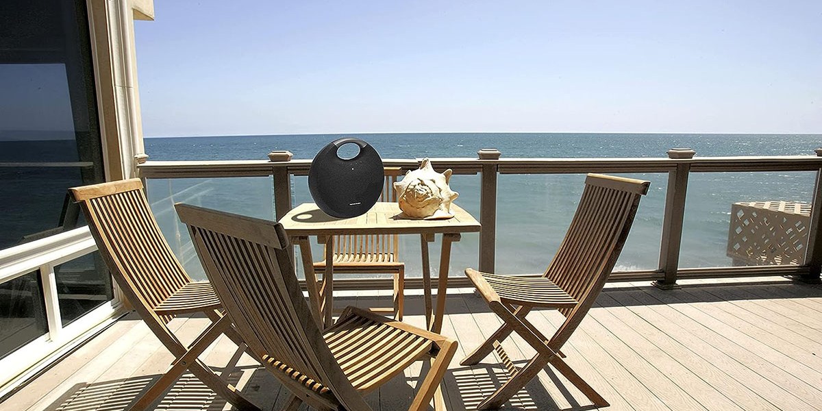 a chair sitting in front of the ocean