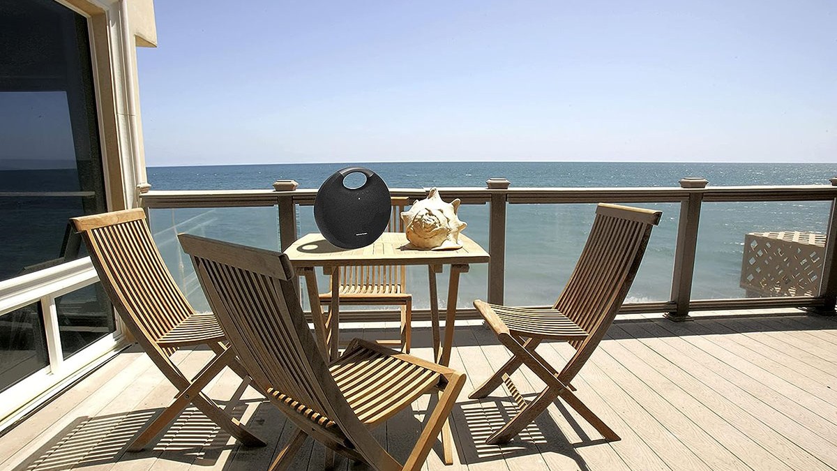 a chair sitting in front of the ocean