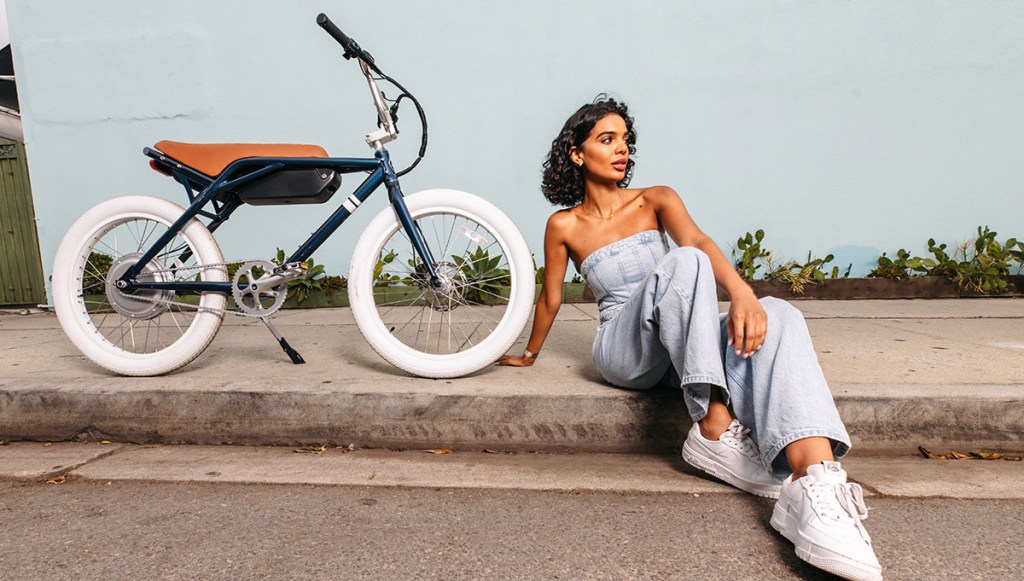 a person sitting on a bicycle