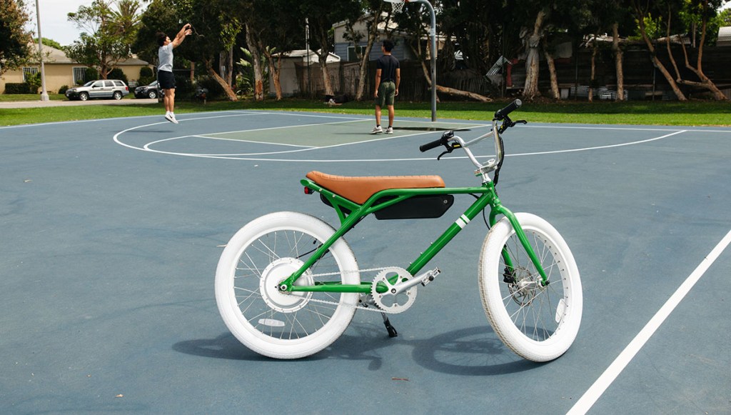 a bicycle parked on the side of a road