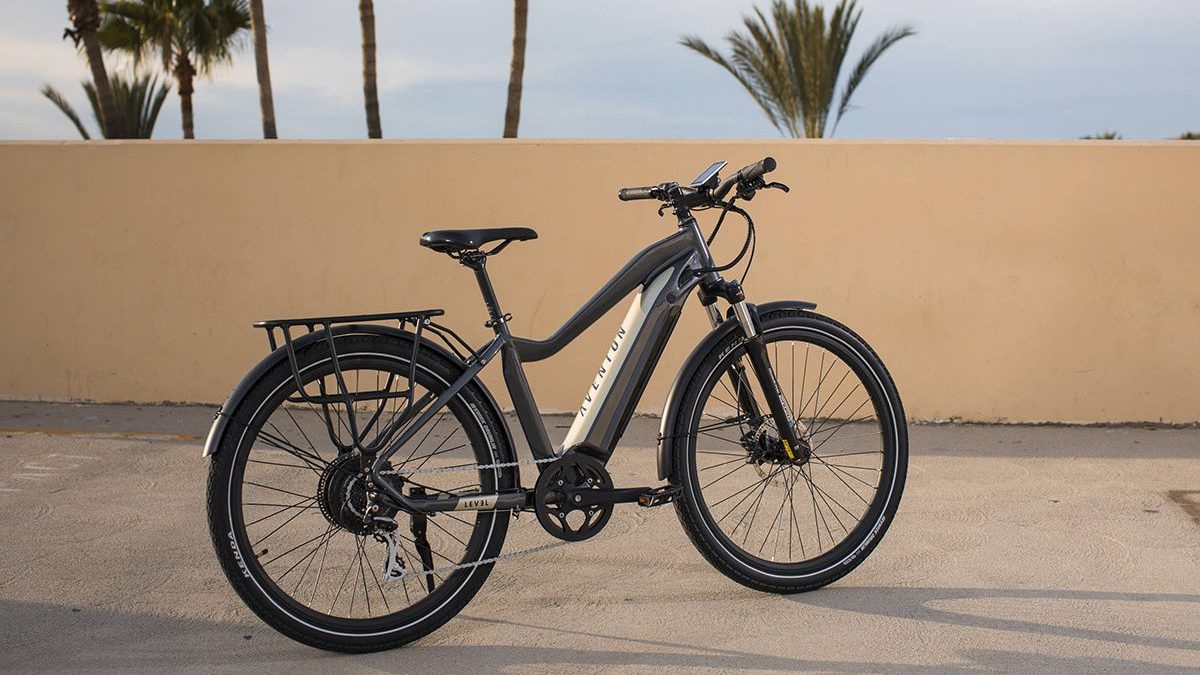 a bicycle parked on a beach