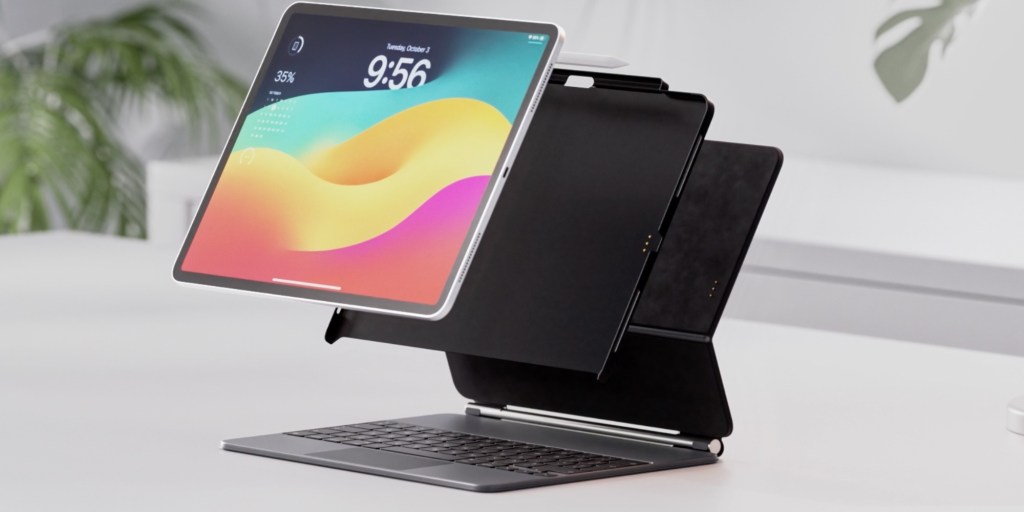 a laptop computer sitting on top of a table