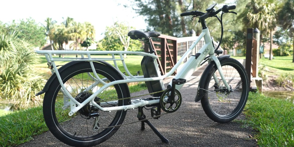 a bicycle parked on the grass