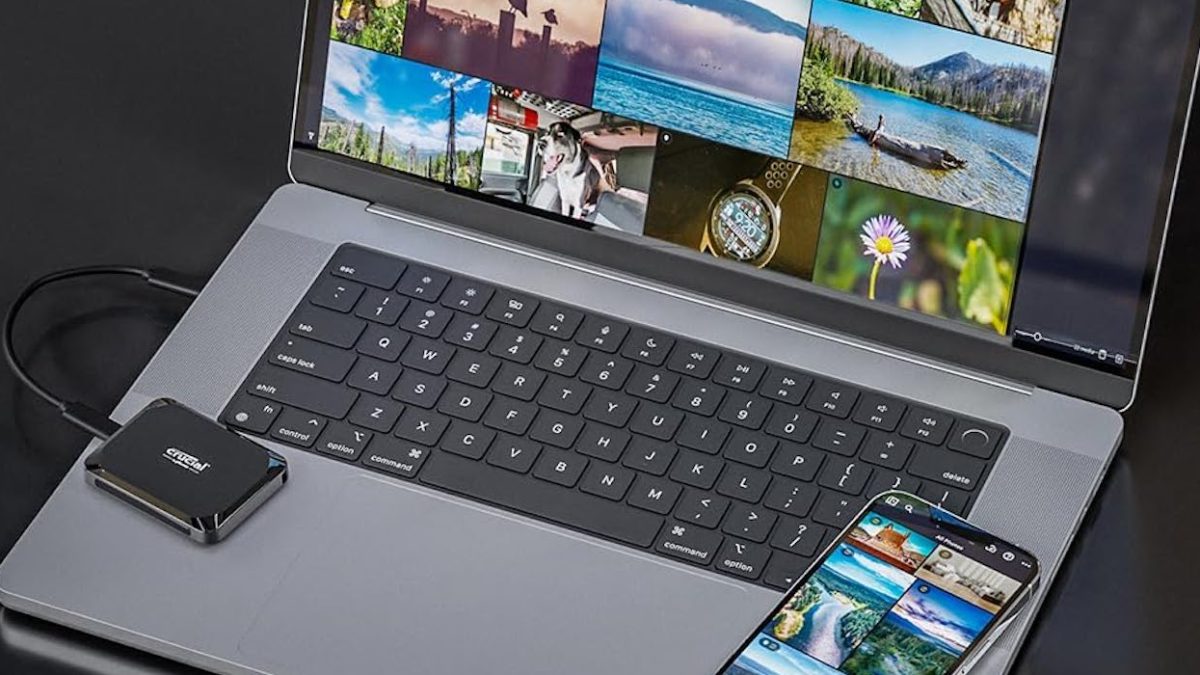 an open laptop computer sitting on top of a table