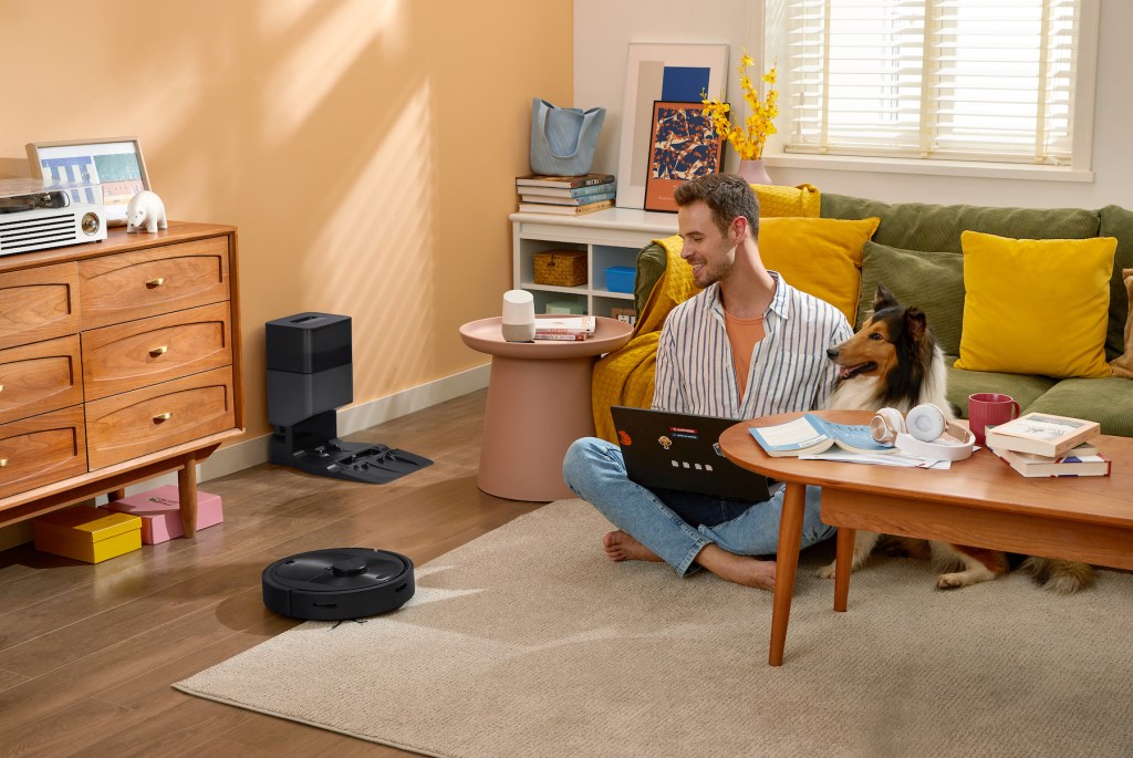 a person sitting at a table in a living room