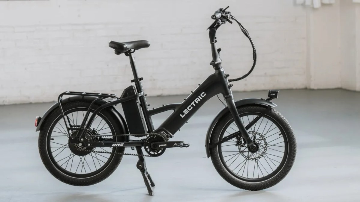 a bicycle parked on the side of a building