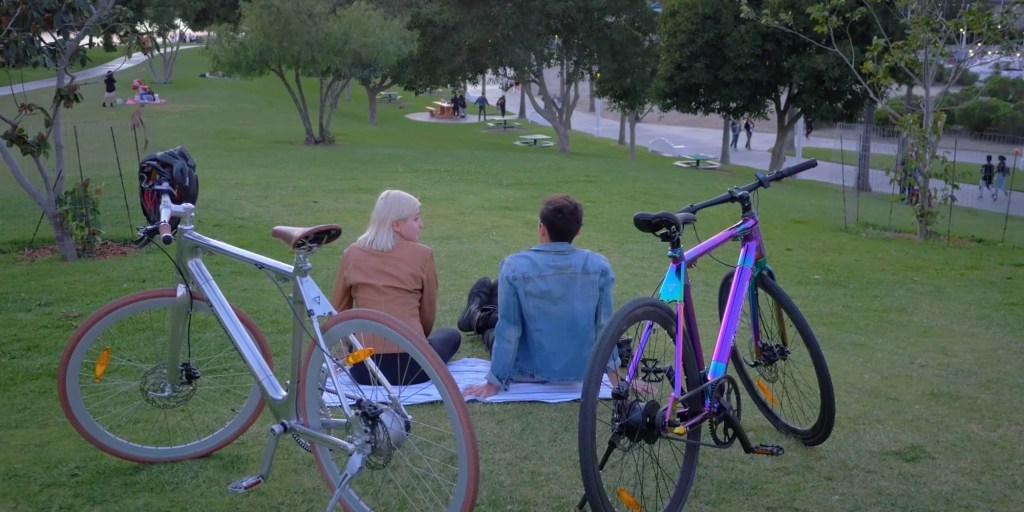 a bicycle parked at a park