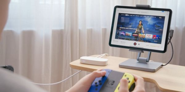 Elgato Game Capture Neo connected to a Nintendo Switch and an iPad.