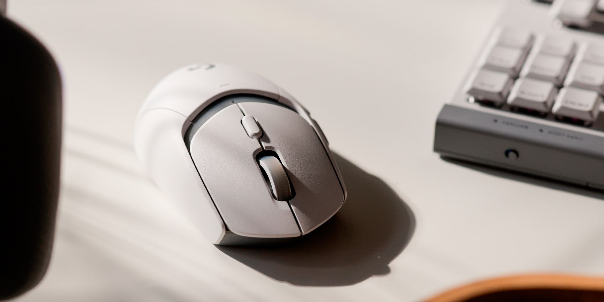 Logitech G309 LIGHTSPEED gaming mouse in white.