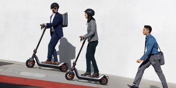 a group of people on segways