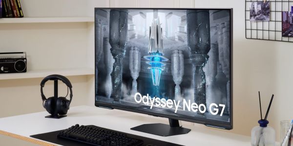 Image showing Samsung's Odyssey Neo G7 4K UHD monitor on a desk.