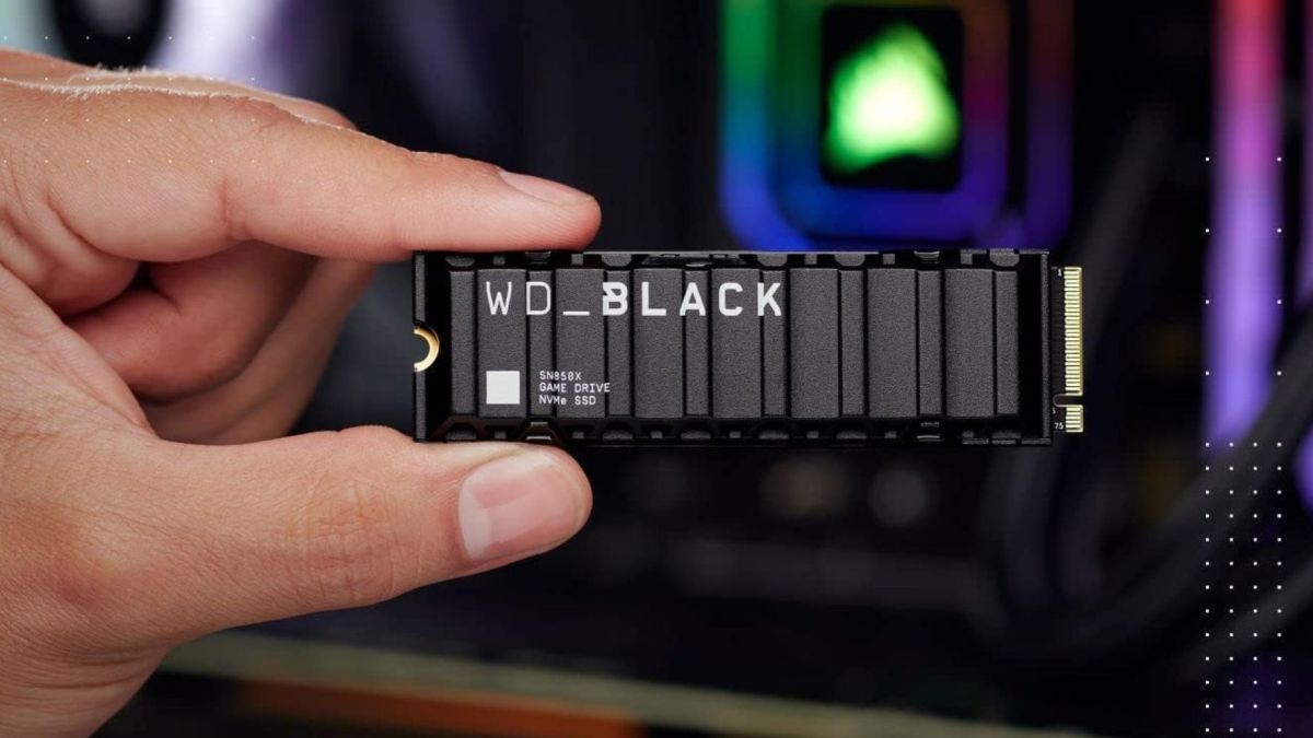 Image showing a person holding WD_BLACK SN850X SSD.