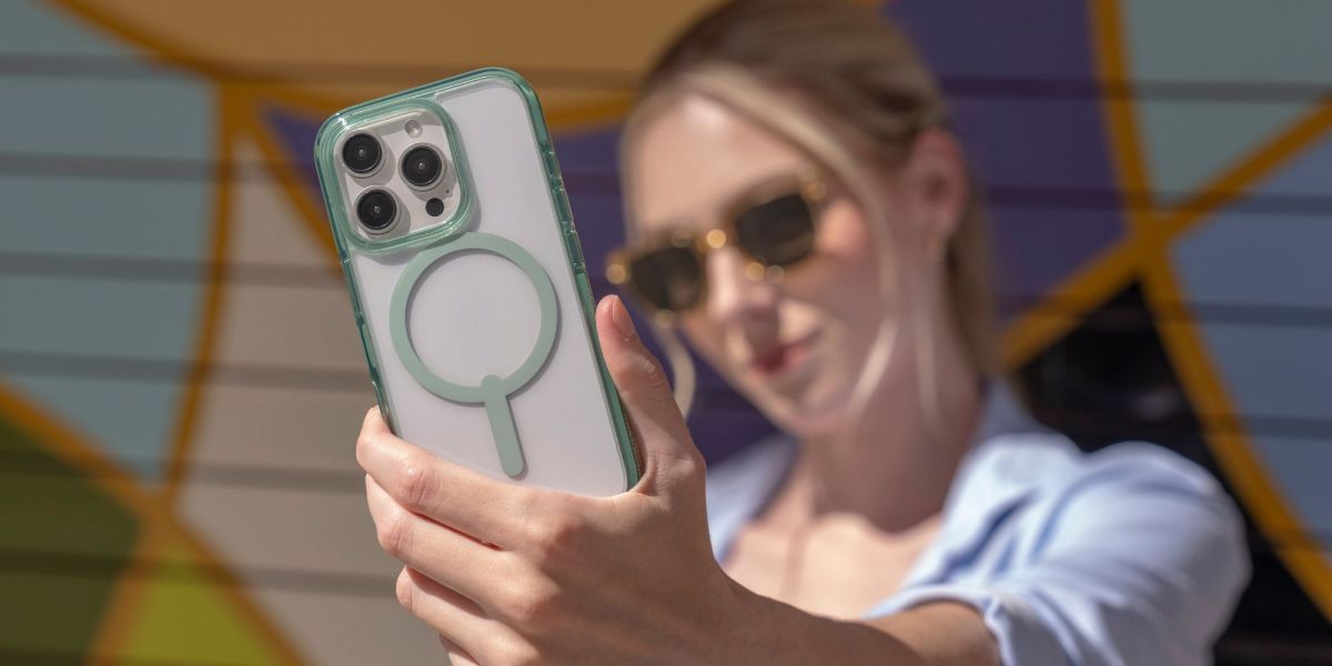 Image showing a person holding an iPhone 16 with a ZAGG case installed on it.