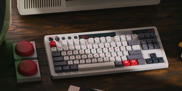 Image showing 8BitDo's Retro Mechanical NES Edition keyboard on a desk.