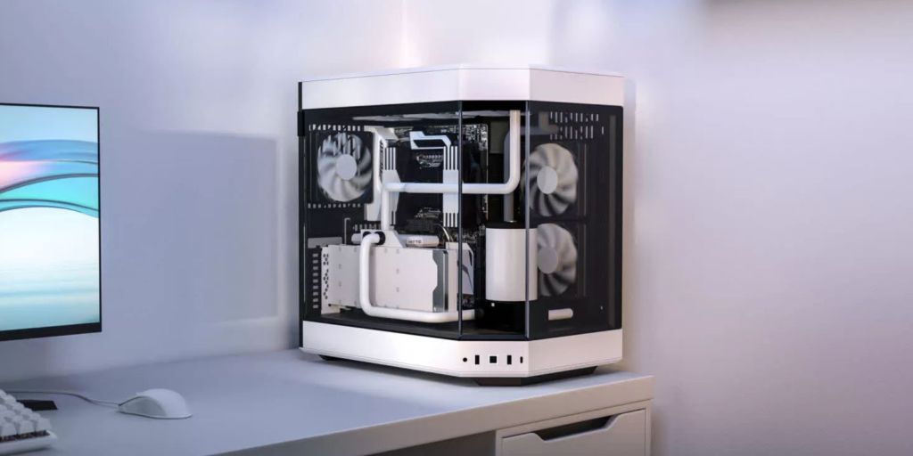 Image showing a render of HYTE Y60 PC case in white on a desk.