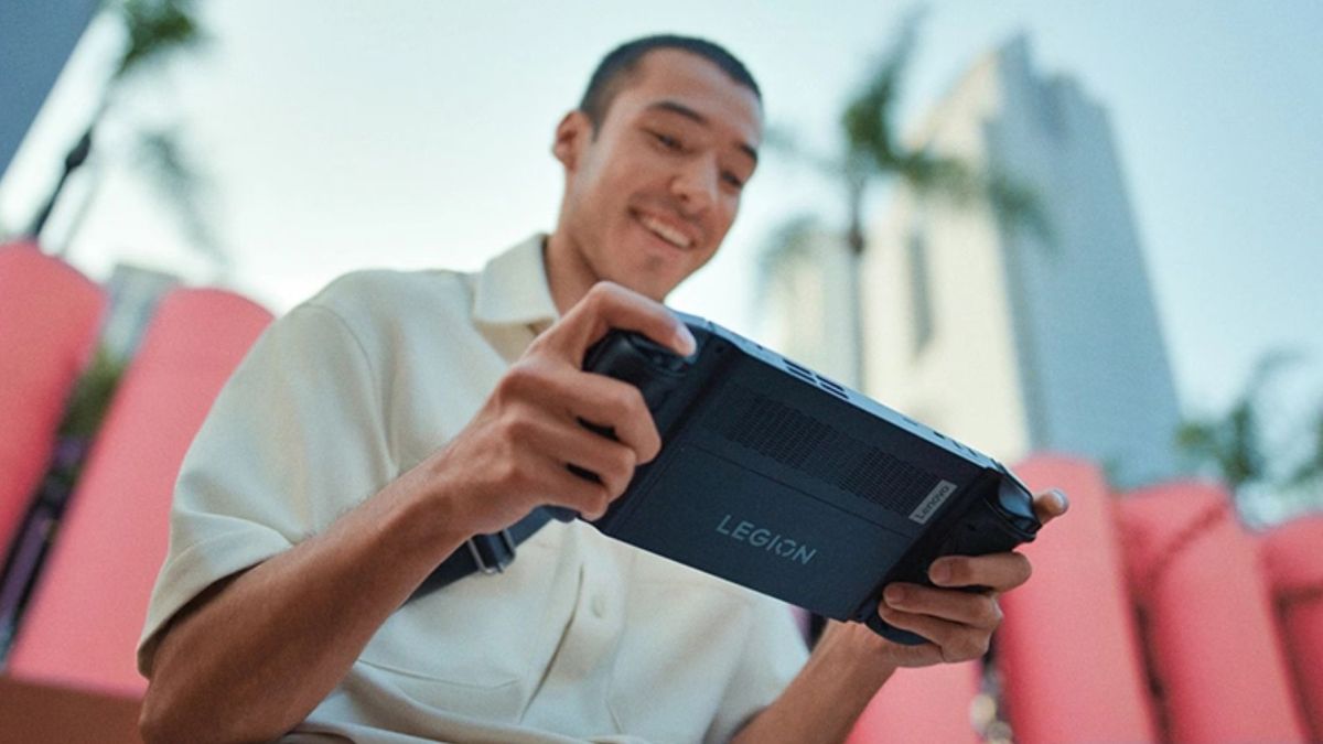 Image showing a person holding Lenovo's Legion gaming handheld.