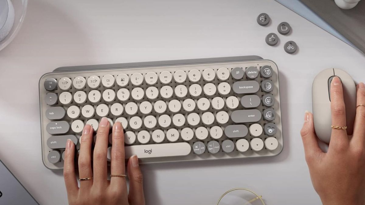 Image showing a person typing on Logitech's POP Key mechanical keyboard.