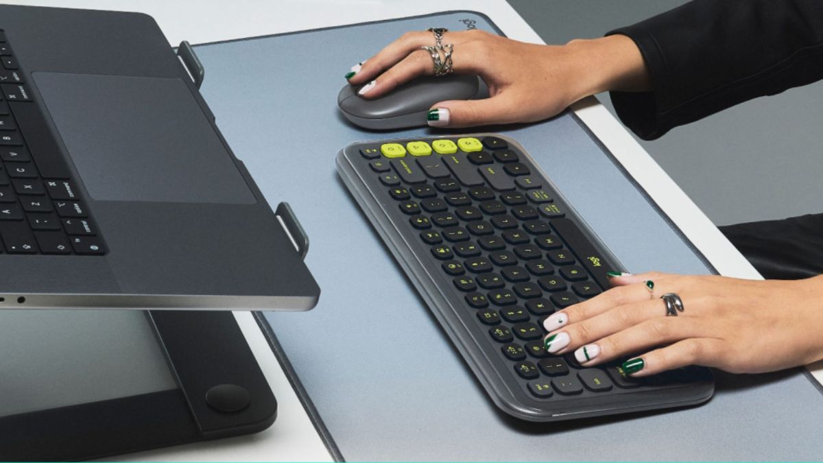 Image showing a person using Logitech's POP ICON Keys wireless keyboard and mouse.