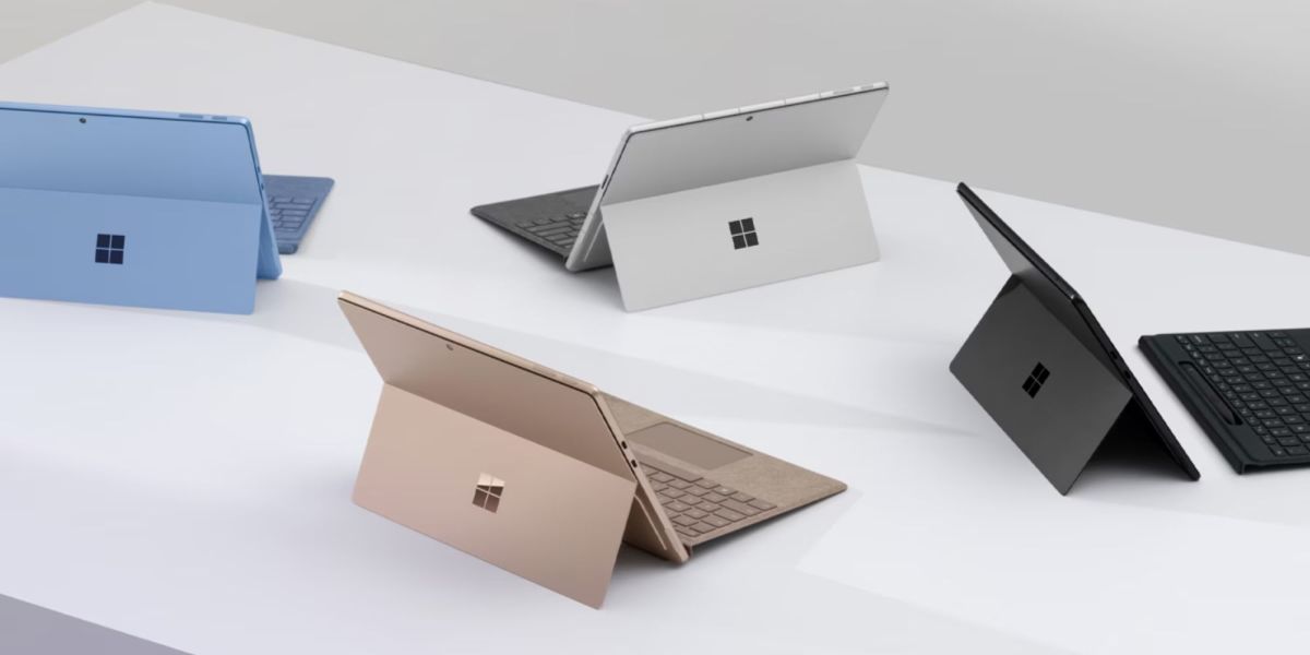 Image showing a bunch of Surface Pro tablets on a desk.