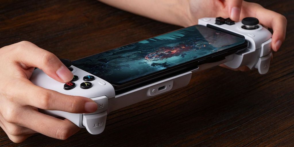 Image showing a person using 8Bitdo's new Ultimate Mobile Controller in white.