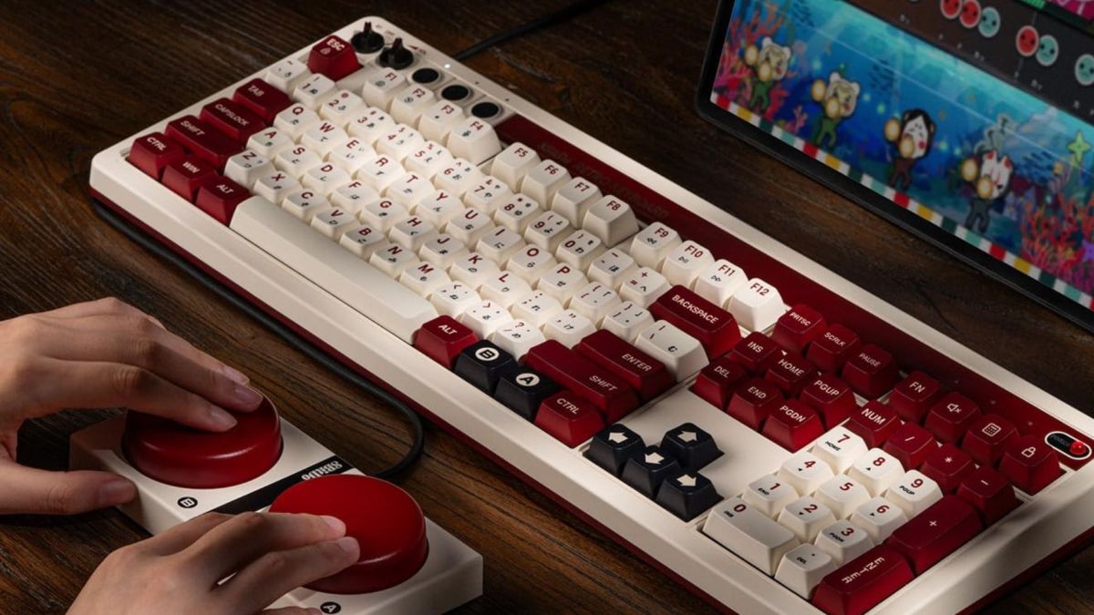 Image showing a person using 8BitDo's new Retro 108 Mechanical keyboard.