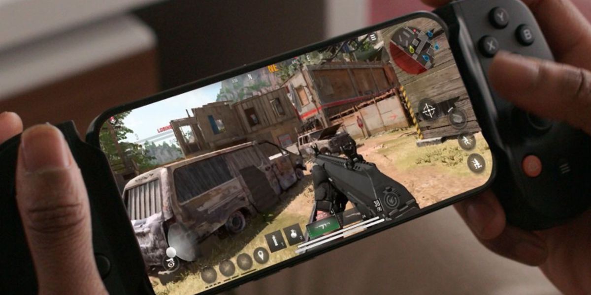 Image showing a person playing Call of Duty Warzone on a phone using the Backbone One controller.