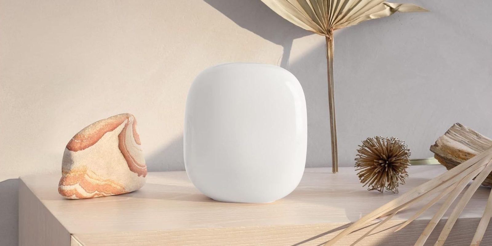 Image showing Google's Nest Pro WiFi 6E router in Linen colorway.