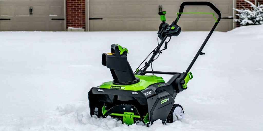 a lawnmower in the snow