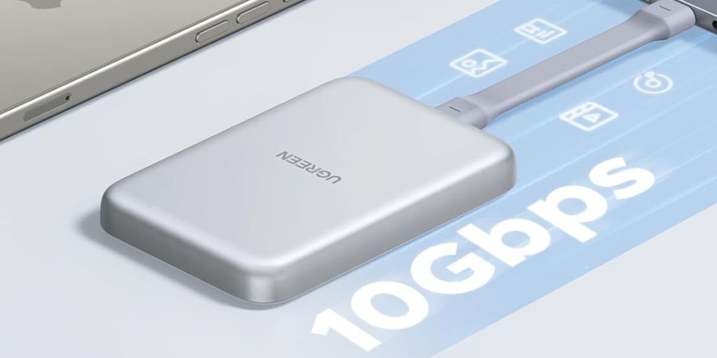 Image showing UGREEN's SSD enclosure connected to a Mac for data transfer.