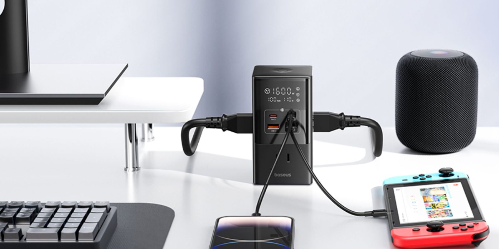 Image showing Baseus' 10-in-1 charging station on a desk powering other devices.