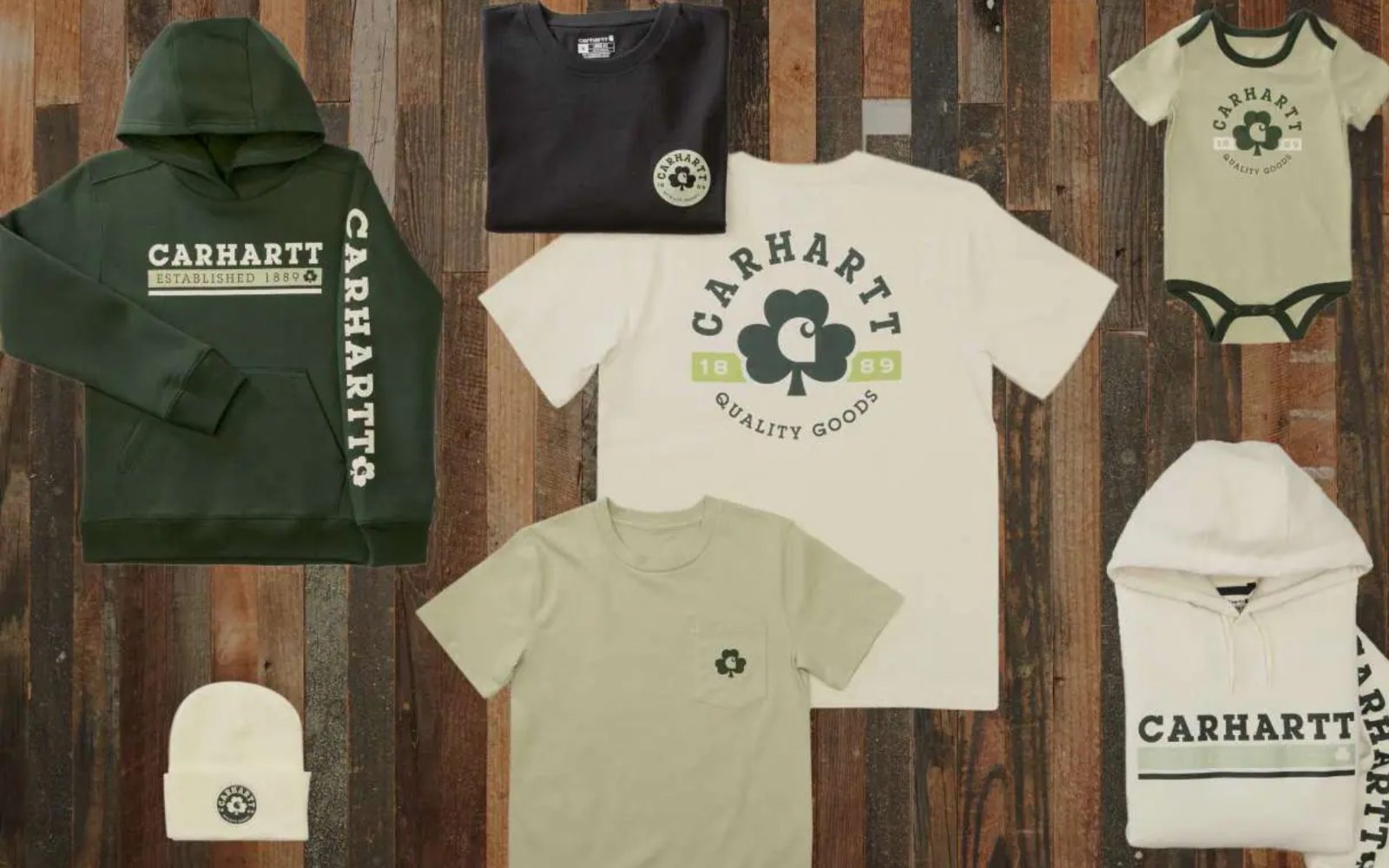 A group of shirts on a wood surface