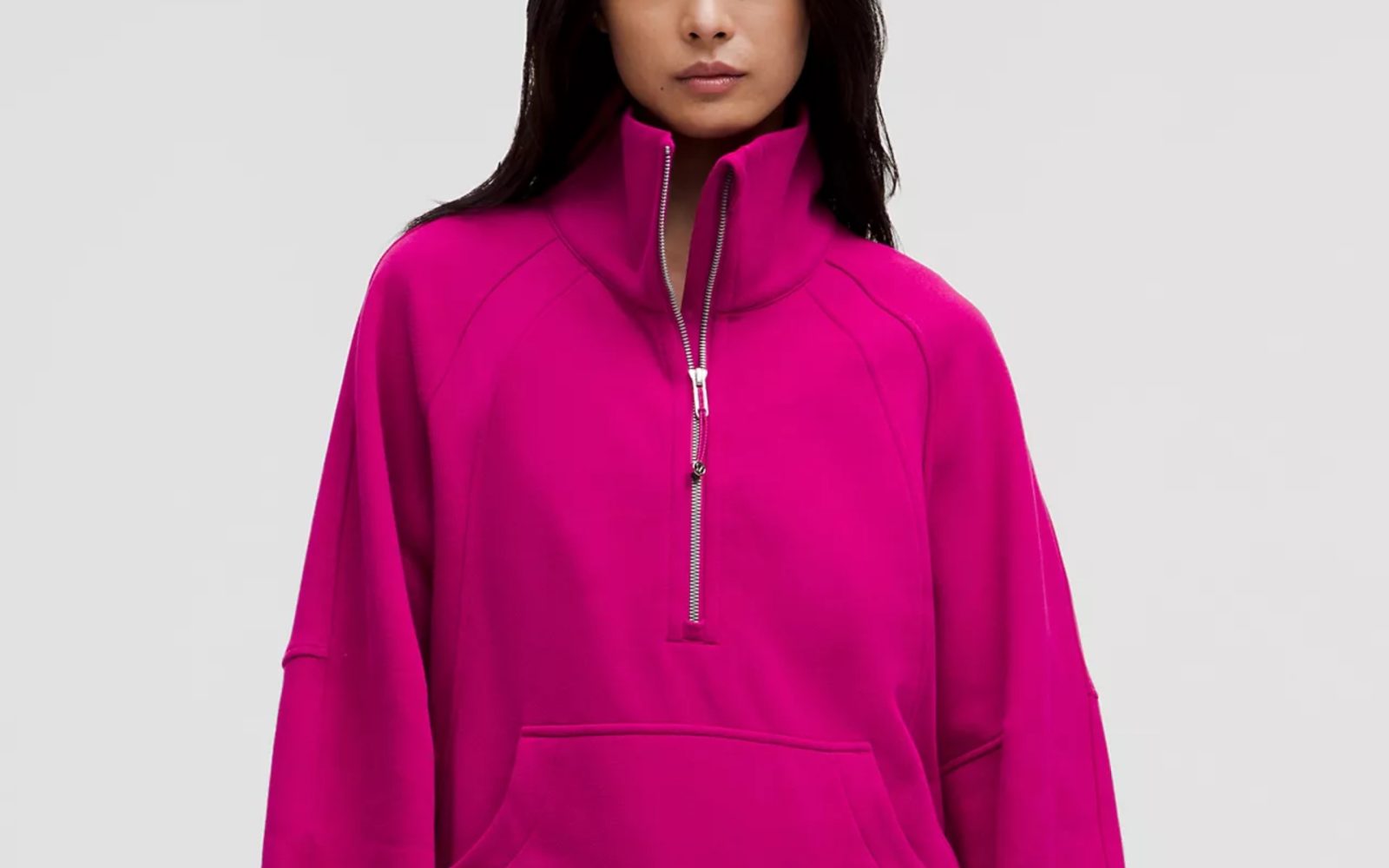 a person wearing a pink jacket