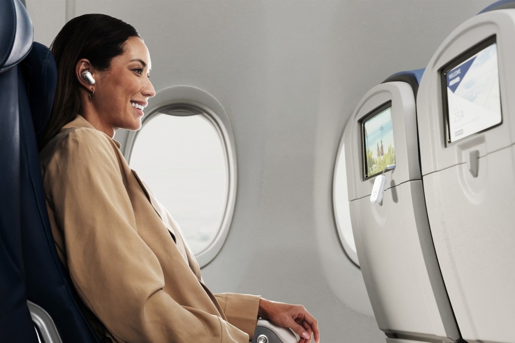 A woman sitting in an airplane