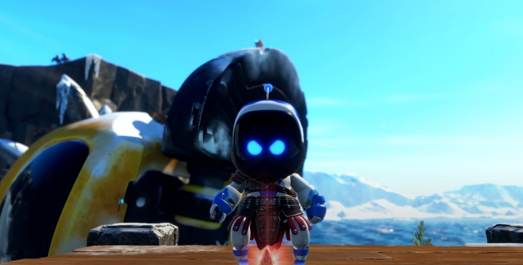 A toy robot standing on a platform