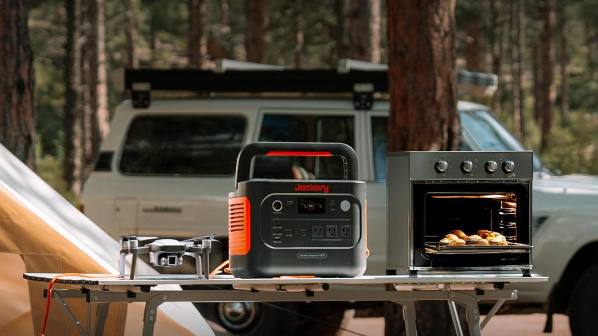 A machine and a microwave on a table