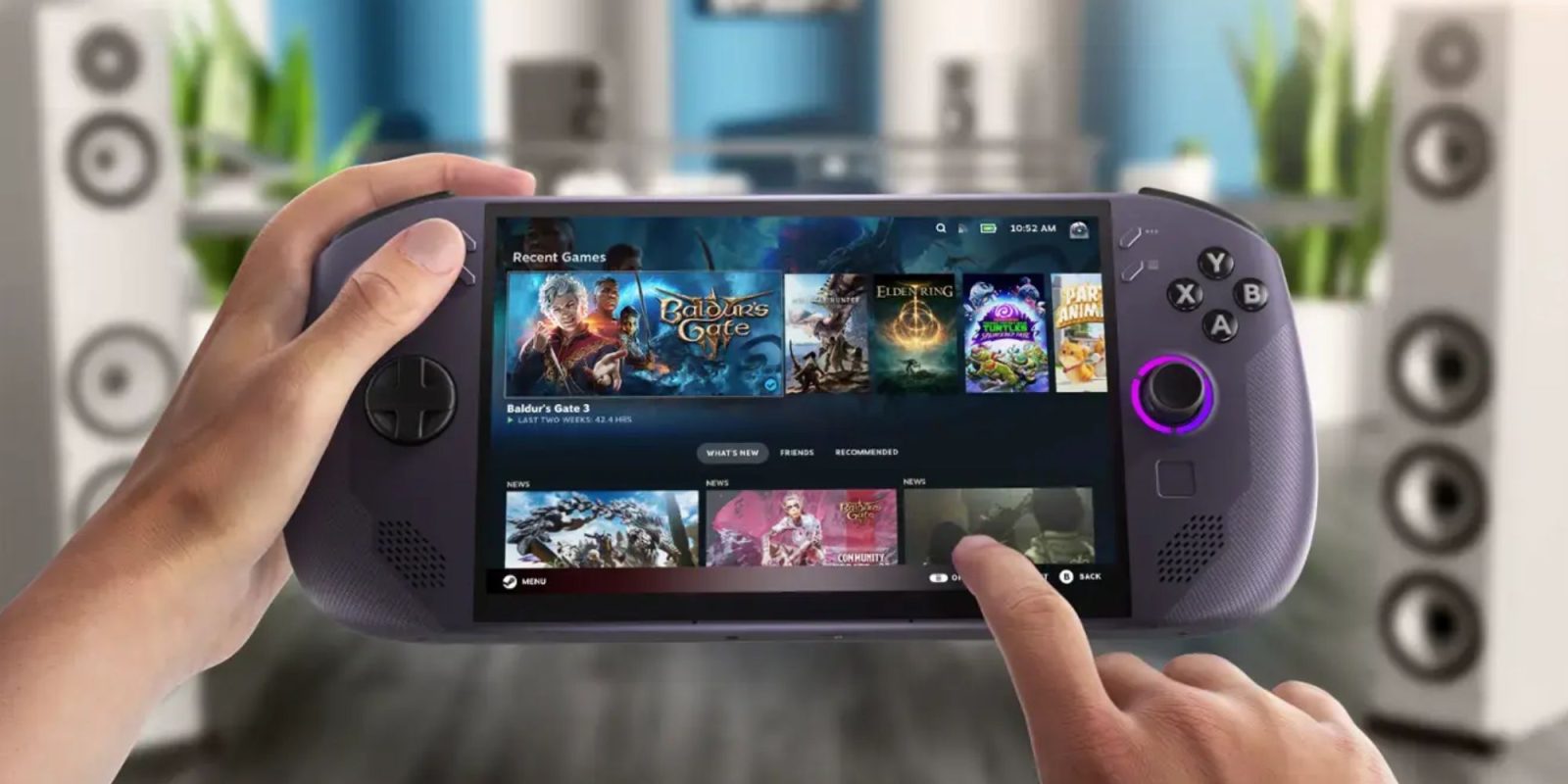 A hand holding a gaming device.