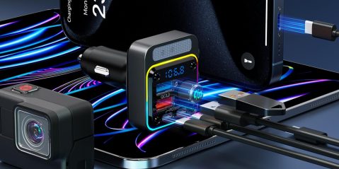 A black device with a multi-port plugged into it