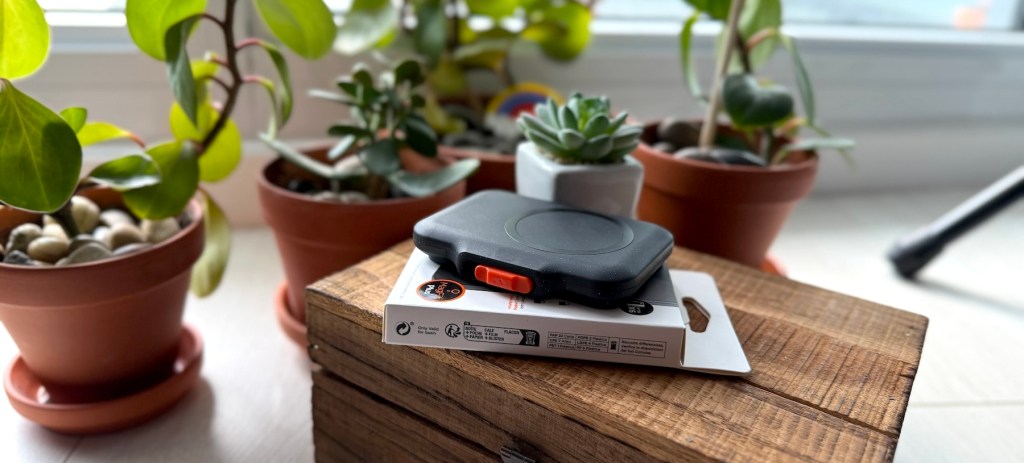 A box with a black cover on top of it