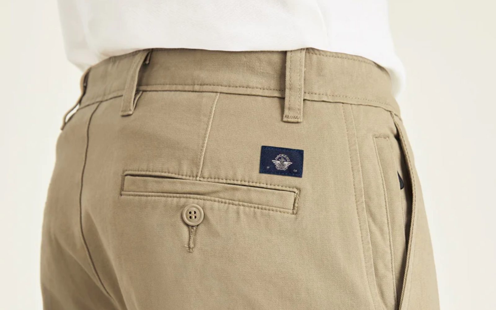 A person wearing khaki pants